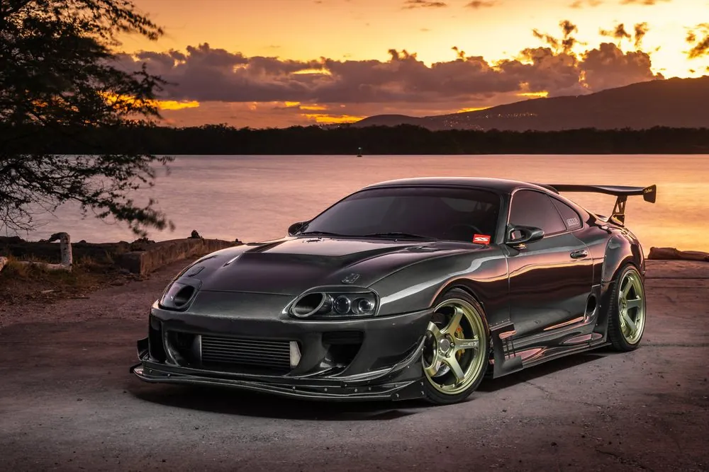 Black Toyota Supra — A show car painted inside and out, with its carbon parts kept fresh.