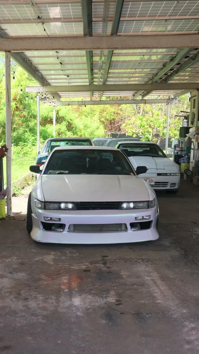 Vehicles under the covered storage roof