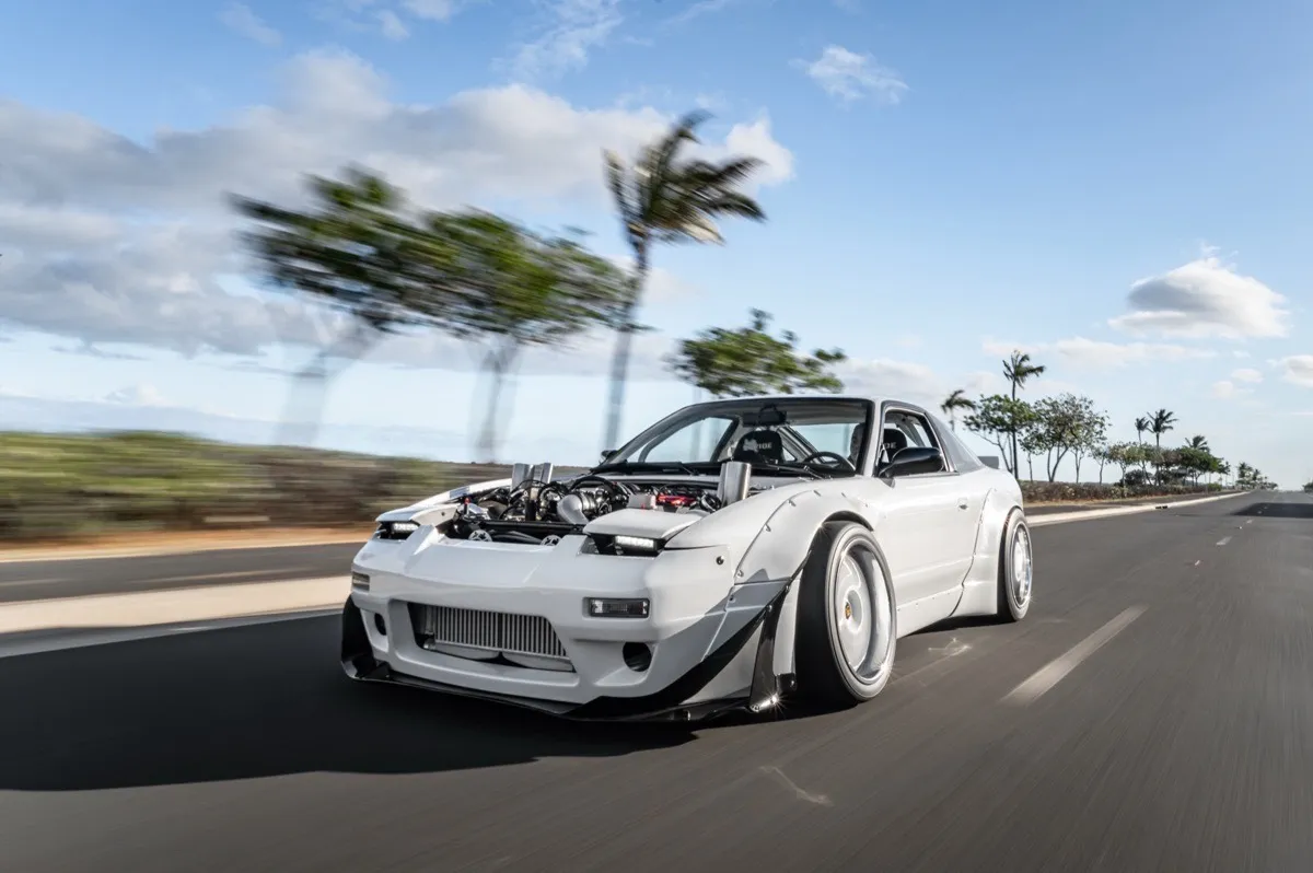 LSX twin-turbo S13 — Full-body paint on a one-of-a-kind Nissan S13 build.